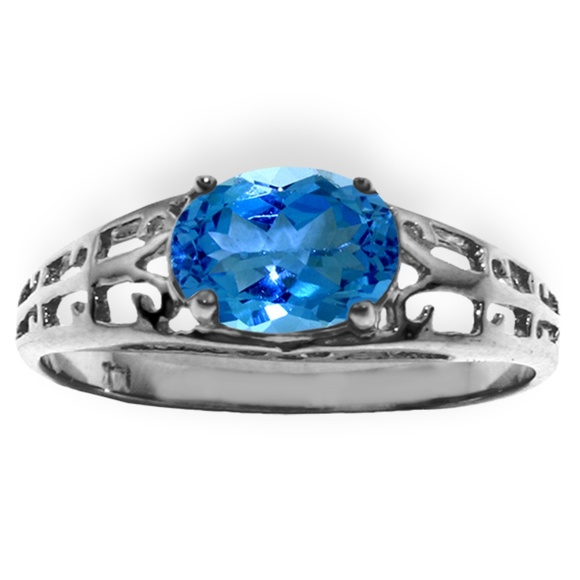 GOLD FILIGREE RING WITH NATURAL BLUE TOPAZ